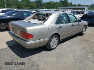 1999 Mercedes-Benz E-Class with VIN WDBJF65H2XA796208, listed as a Copart auction lot 62738904 with 156,283 mi miles and Salvage Title. Bid and sale history available at carsss.com. Image 12.