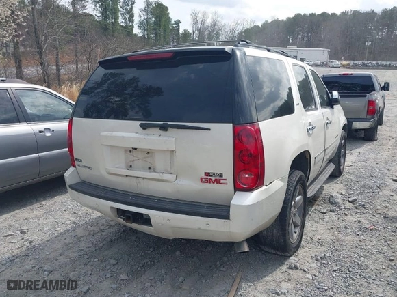 2009 GMC Yukon SLT w/4SB with VIN 1GKFC33059R272099, listed as a IAAI auction lot 41802785 with 240,081 mi miles. Bid and sale history available at carsss.com. Image 4.