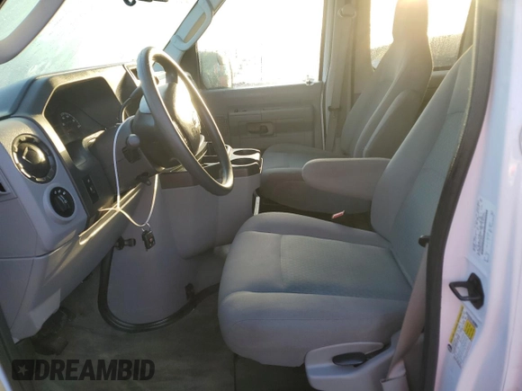 2014 Ford Econoline Passenger XL with VIN 1FBNE3BL2EDA40620, listed as a Copart auction lot 74464474 with 76,388 mi miles and Salvage Title. Bid and sale history available at DreamBid. Image 7.