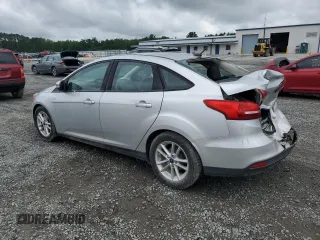 2016 Ford Focus SE with VIN 1FADP3F22GL402818, listed as a Copart auction lot 59500485 with 142,814 mi miles and Salvage title. Bid and sale history available at DreamBid. Image 2.
