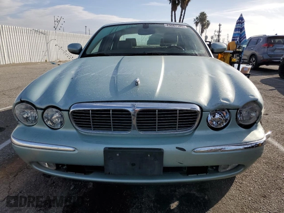 2005 Jaguar XJ with VIN SAJWA79C15SG47018, listed as a Copart auction lot 43087185 with 31,725 mi miles and Salvage Title. Bid and sale history available at carsss.com. Image 5.