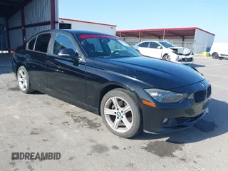 2014 BMW 3 Series 328i with VIN WBA3A5G54ENP31921, listed as a IAAI auction lot 42374240 with 148,671 mi miles and . Bid and sale history available at DreamBid. Image 1.