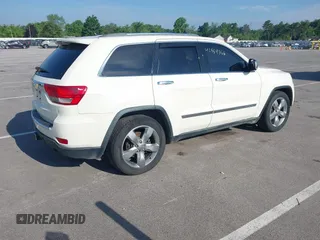 2011 Jeep Grand Cherokee Overland with VIN 1J4RR6GT2BC631909, listed as a IAAI auction lot 42564356 with 205,954 mi miles and . Bid and sale history available at DreamBid. Image 4.