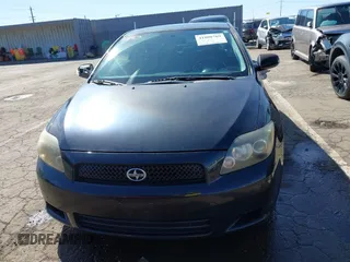 2009 Scion tC with VIN JTKDE167090284572, listed as a IAAI auction lot 41808769 with 132,474 mi miles. Bid and sale history available at carsss.com. Image 12.