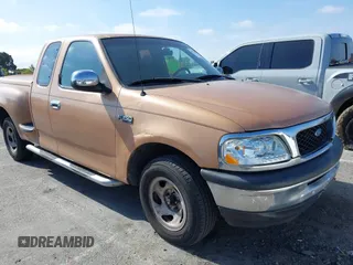 1997 Ford F-150 with VIN 1FTDX0766VKA87180, listed as a IAAI auction lot 42160403 with 162,103 mi miles and . Bid and sale history available at DreamBid. Image 1.