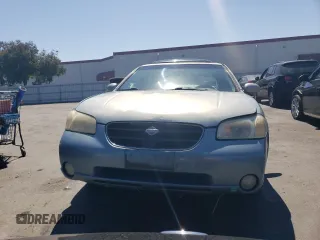 2000 Nissan Maxima GXE z VIN JN1CA31D9YT543874, wystawiony jako Copart lot #69275784 z przebiegiem 214 833 mil mil oraz Szkoda całkowita • Salvage title. Historia ofert i sprzedaży dostępna na DreamBid. Obrazek 5.