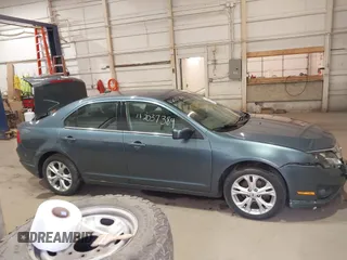 2012 Ford Fusion SE z VIN 3FAHP0HA9CR180004, wystawiony jako IAAI lot #42037384 z przebiegiem 111 262 mil mil oraz . Historia ofert i sprzedaży dostępna na DreamBid. Obrazek 13.