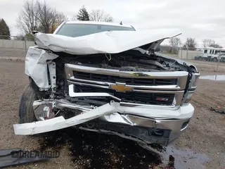 2014 Chevrolet Silverado 1500 LT with VIN 1GCVKREC2EZ390061, listed as a IAAI auction lot 40824477 with 140,928 mi miles and . Bid and sale history available at DreamBid. Image 6.