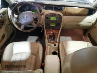 2004 Jaguar X-Type with VIN SAJEA51C34WE06046, listed as a Copart auction lot 56982105 with 69,265 mi miles and Clean Title. Bid and sale history available at DreamBid. Image 8.