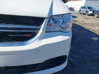 2013 Dodge Grand Caravan SE with VIN 2C4RDGBG0DR760598, listed as a IAAI auction lot 41590428 with 182,847 mi miles and . Bid and sale history available at DreamBid. Image 6.