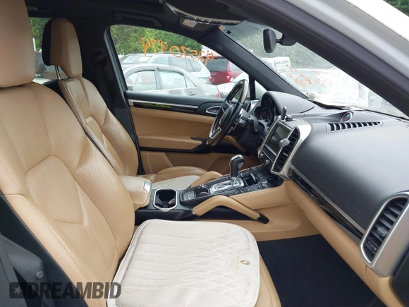 2016 Porsche Cayenne Turbo S E-Hybrid with VIN WP1AA2A27GLA09458, listed as a IAAI auction lot 42570474 with 97,820 mi miles and . Bid and sale history available at DreamBid. Image 5.