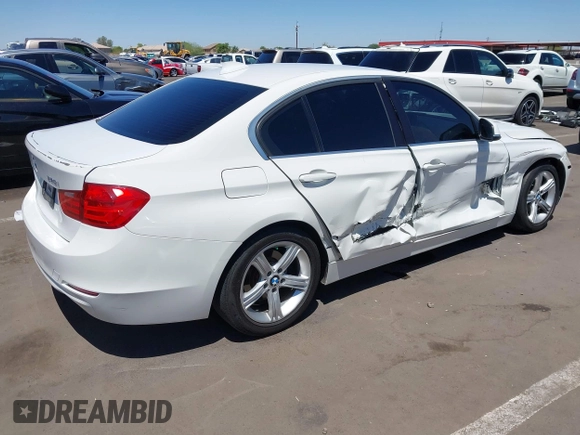 2015 BMW 3 Series 328i with VIN WBA3C1C52FK117753, listed as a IAAI auction lot 42270013 with 147,386 mi miles and . Bid and sale history available at DreamBid. Image 4.