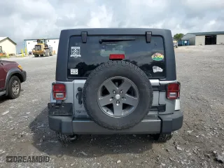 2013 Jeep Wrangler Unlimited Sport with VIN 1C4BJWDG1DL601972, listed as a Copart auction lot 65069824 with 166,274 mi miles and Salvage Title. Bid and sale history available at carsss.com. Image 6.