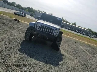 2014 Jeep Wrangler Unlimited Sahara with VIN 1C4HJWEG1EL126611, listed as a Copart auction lot 57169485 with 122,000 mi miles and Salvage title. Bid and sale history available at DreamBid. Image 14.