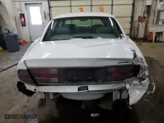 1999 Buick Park Avenue Ultra with VIN 1G4CU5216X4660725, listed as a Copart auction lot 88469265 with 180,585 mi miles and Salvage Title. Bid and sale history available at carsss.com. Image 6.