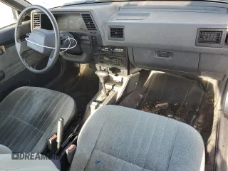 1990 Nissan Sentra z VIN 1N4GB22B7LC773110, wystawiony jako Copart lot #55384855 z przebiegiem 48 159 mil mil oraz Tytuł czysty. Historia ofert i sprzedaży dostępna na DreamBid. Obrazek 8.