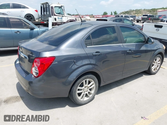2012 Chevrolet Sonic LT with VIN 1G1JC5SH1C4182616, listed as a IAAI auction lot 42081899 with 92,802 mi miles and . Bid and sale history available at DreamBid. Image 4.