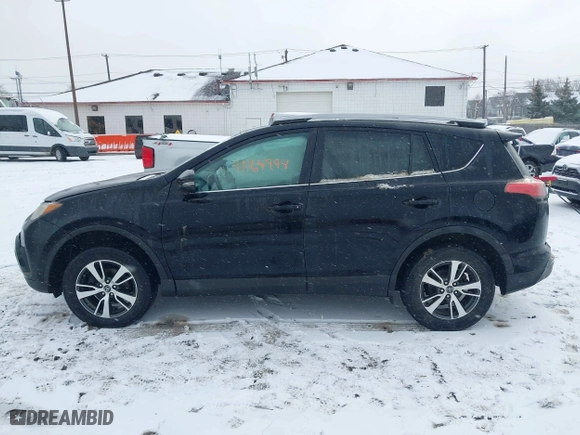 2018 Toyota RAV4 XLE with VIN 2T3RFREV8JW851250, listed as a IAAI auction lot 41164994 with 63,005 mi miles. Bid and sale history available at carsss.com. Image 14.