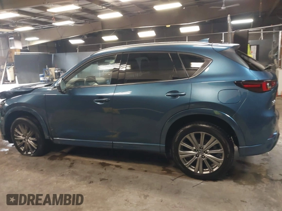 2023 Mazda CX-5 Signature with VIN JM3KFBXY4P0120187, listed as a IAAI auction lot 41706264 with 9,402 mi miles and . Bid and sale history available at carsss.com. Image 14.