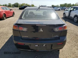 2014 Mitsubishi Lancer DE with VIN JA32U1FU5EU606549, listed as a Copart auction lot 69962674 with 169,341 mi miles and Salvage Title. Bid and sale history available at DreamBid. Image 6.