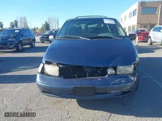 1997 Nissan Quest XE with VIN 4N2DN1118VD850276, listed as a IAAI auction lot 41403441 with 207,530 mi miles. Bid and sale history available at carsss.com. Image 12.