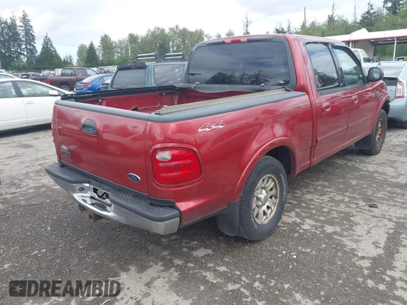 2001 Ford F-150 XLT with VIN 1FTRW08L91KE59120, listed as a IAAI auction lot 42301677 with Not provided miles and . Bid and sale history available at DreamBid. Image 4.