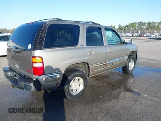 2001 GMC Yukon SLT with VIN 1GKEK13T11R168999, listed as a IAAI auction lot 41778926 with 163,388 mi miles. Bid and sale history available at carsss.com. Image 4.