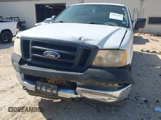 2005 Ford F-150 XLT with VIN 1FTPX14505NA67097, listed as a IAAI auction lot 42012449 with 192,258 mi miles. Bid and sale history available at carsss.com. Image 6.
