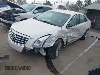 2014 Cadillac XTS Luxury with VIN 2G61M5S3XE9185493, listed as a IAAI auction lot 41711302 with 89,725 mi miles. Bid and sale history available at carsss.com. Image 17.