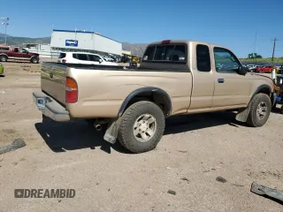 1999 Toyota Tacoma with VIN 4TAWN72N4XZ560411, listed as a Copart auction lot 61499925 with 395,215 mi miles and Salvage title. Bid and sale history available at DreamBid. Image 3.