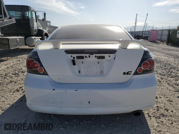 2009 Scion tC z VIN JTKDE167190282832, wystawiony jako Copart lot #53359705 z przebiegiem 227 341 mil mil oraz Szkoda całkowita • Salvage title. Historia ofert i sprzedaży dostępna na DreamBid. Obrazek 6.