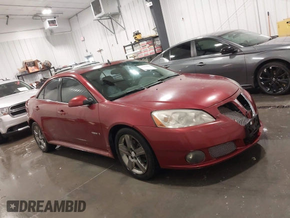 2009 Pontiac G6 GXP 1SA with VIN 1G2ZM577X94157511, listed as a IAAI auction lot 42296880 with 143,960 mi miles and . Bid and sale history available at DreamBid. Image 13.