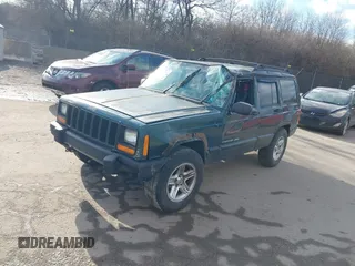 2000 Jeep Cherokee Classic with VIN 1J4FF58S6YL105920, listed as a IAAI auction lot 41497047 with 192,410 mi miles. Bid and sale history available at carsss.com. Image 2.