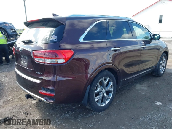 2016 Kia Sorento SX with VIN 5XYPKDA58GG002304, listed as a IAAI auction lot 41990332 with 132,025 mi miles. Bid and sale history available at carsss.com. Image 4.