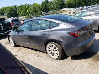 2022 Tesla Model 3 Long Range with VIN 5YJ3E1EB5NF105785, listed as a Copart auction lot 61304654 with 37,306 mi miles and Salvage Title. Bid and sale history available at DreamBid. Image 2.