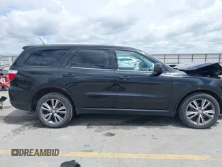 2013 Dodge Durango SXT with VIN 1C4RDJAG4DC697450, listed as a IAAI auction lot 42336657 with 177,476 mi miles and . Bid and sale history available at DreamBid. Image 13.