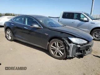 2014 Tesla Model S 60 z VIN 5YJSA1S19EFP56100, wystawiony jako Copart lot #62331725 z przebiegiem Nie podano mil oraz Szkoda całkowita • Salvage title. Historia ofert i sprzedaży dostępna na DreamBid. Obrazek 4.
