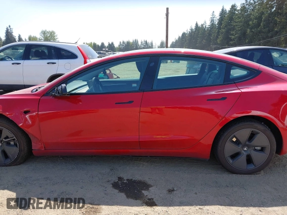 2023 Tesla Model 3 Long Range with VIN 5YJ3E1EBXPF603421, listed as a IAAI auction lot 42105037 with 13,186 mi miles and . Bid and sale history available at DreamBid. Image 14.