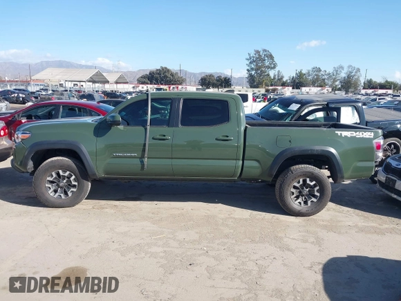2021 Toyota Tacoma 4WD SR5 with VIN 3TMDZ5BN2MM101265, listed as a IAAI auction lot 41272874 with 51,989 mi miles. Bid and sale history available at carsss.com. Image 15.