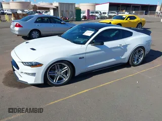 2021 Ford Mustang GT z VIN 1FA6P8CF5M5142279, wystawiony jako IAAI lot #42165065 z przebiegiem 30 109 mil mil oraz . Historia ofert i sprzedaży dostępna na DreamBid. Obrazek 2.