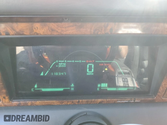 1989 Chrysler LeBaron z VIN 1C3XJ55J9KG275438, wystawiony jako Copart lot #73026764 z przebiegiem 118 347 mil mil oraz Tytuł czysty. Historia ofert i sprzedaży dostępna na DreamBid. Obrazek 9.