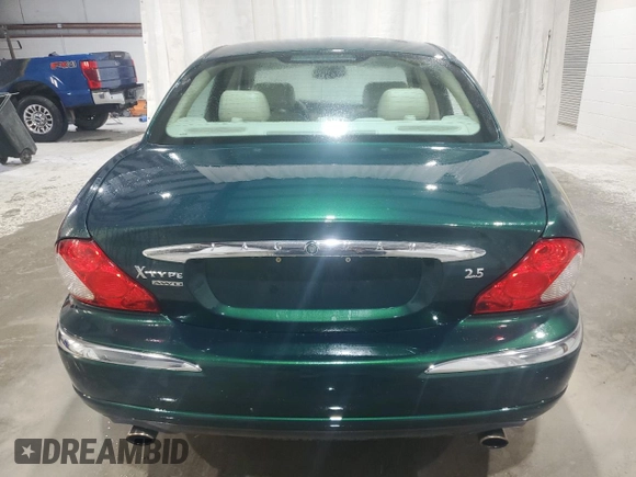 2003 Jaguar X-Type 2.5L Manual z VIN SAJEA51D63XD54591, wystawiony jako Copart lot #57638355 z przebiegiem 93 905 mil mil oraz Szkoda całkowita • Salvage title. Historia ofert i sprzedaży dostępna na DreamBid. Obrazek 6.