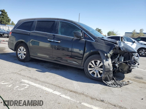 2014 Honda Odyssey EX-L with VIN 5FNRL5H6XEB129098, listed as a Copart auction lot 52211625 with Not Provided miles and Salvage Title. Bid and sale history available at carsss.com. Image 4.