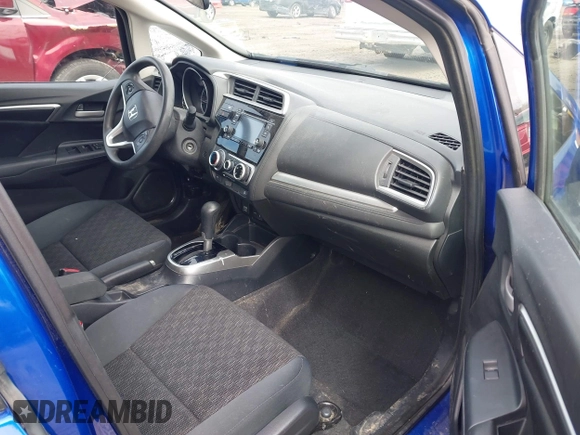 2015 Honda Fit LX with VIN 3HGGK5H52FM710434, listed as a IAAI auction lot 42022022 with 104,118 mi miles. Bid and sale history available at carsss.com. Image 5.