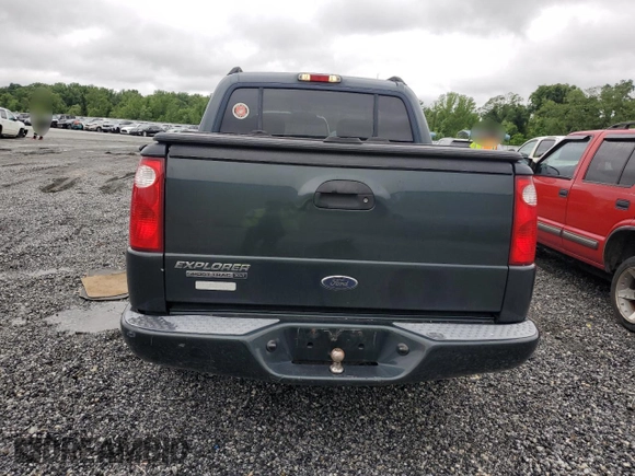 2004 Ford Explorer Sport Trac XLS with VIN 1FMZU67K04UA70503, listed as a Copart auction lot 58214785 with 195,688 mi miles and Salvage title. Bid and sale history available at DreamBid. Image 6.