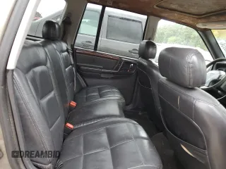 1997 Jeep Grand Cherokee Limited with VIN 1J4GZ78Y0VC599554, listed as a Copart auction lot 72006854 with 321,283 mi miles and Salvage Title. Bid and sale history available at carsss.com. Image 11.