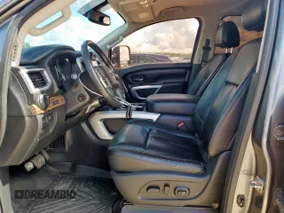 2016 Nissan Titan Platinum Reserve with VIN 1N6BA1F49GN503106, listed as a Copart auction lot 62740215 with 155,659 mi miles and Clean title. Bid and sale history available at DreamBid. Image 7.