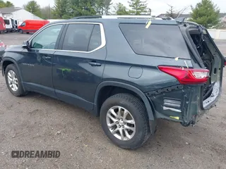 2018 Chevrolet Traverse LT Cloth z VIN 1GNEVGKW7JJ156198, wystawiony jako IAAI lot #41909259 z przebiegiem 82 719 mil mil oraz . Historia ofert i sprzedaży dostępna na DreamBid. Obrazek 3.
