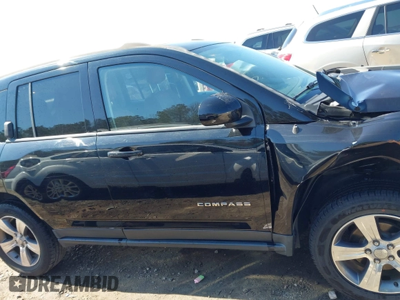 2017 Jeep Compass High Altitude with VIN 1C4NJDEB9HD108724, listed as a IAAI auction lot 41673207 with 87,884 mi miles and . Bid and sale history available at carsss.com. Image 13.