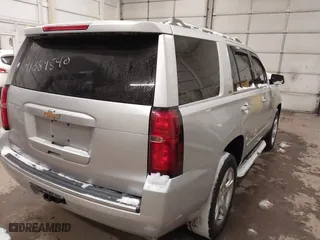 2016 Chevrolet Tahoe LTZ with VIN 1GNSKCKCXGR284827, listed as a IAAI auction lot 41389540 with 93,150 mi miles. Bid and sale history available at carsss.com. Image 4.